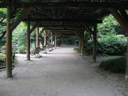 A path with wood roofs at Hibiya Park